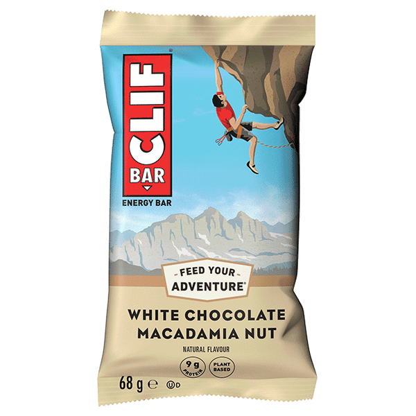 Barre CLIF White Chocolate Macadamia Nut aux noix de macadamia grillées et chocolat blanc, apportant 9 g de protéines pour accompagner toutes vos aventures.
